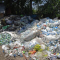 Piled up bottle plastic at a temporary dumping site in Pulwama, India