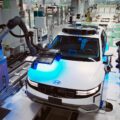 An electric vehicle being assembled in Singapore, part of the electrification process that could help them achieve net-zero.