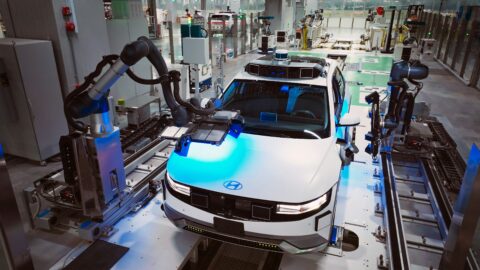 An electric vehicle being assembled in Singapore, part of the electrification process that could help them achieve net-zero.