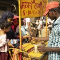 How does climate change impact Delhi's Red Fort market traders?