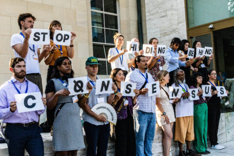 Campaigners doing a demonstration as plastics treaty talks enter the final stage in Geneva.As UN talks for a plastics treaty reach their endgame, campaigners call for a vote that could help limit plastics production