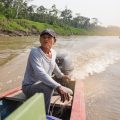 man on boat in the Amazon